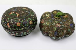 A Chinese circular lidded enamelled jar. 9cm diameter, another of fruit form. 10cm diameter and a