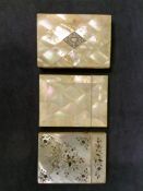 Three Victorian mother of pearl card cases, one inset with floral abalone designs. (3)