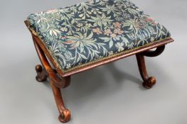 A carved rosewood William IV dressing stool. Scrolled ‘X’ form tapestry feet.