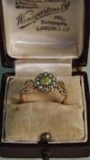 A late 19th Century seed pearl and peridot set cluster ring.