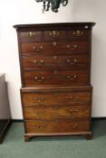 A George III mahogany chest on chest. Moulded cornice over three short and six long graduated