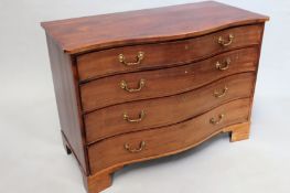 A George III mahogany serpentine fronted chest with four long graduated drawers. 120cm wide x 59cm