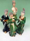 Three Tang style Saucai figures of musicians. 31, 33 & 35cm high respectively.