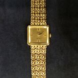 A Ladies Omega De Ville 18ct gold bracelet watch. Total weight 65grams.