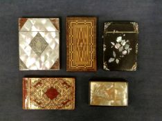 A Victorian papier mache card case with gilded and inset abalone designs, a Victorian parquetry