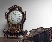 A late 18th Century French bracket clock with circular enamel dial, later brass movement, ormolu