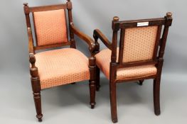 A pair of 19th Century carved oak armchairs in the William IV taste. One bearing ivorine label