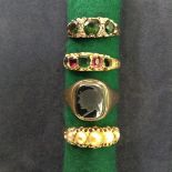 A Victorian 15ct gold gem set ring, an Edwardian pearl five stone ring and two others (4).