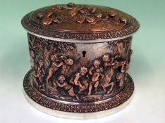 A Victorian silvered copper oval tea caddy with figural decoration. Overall scenes of cavorting