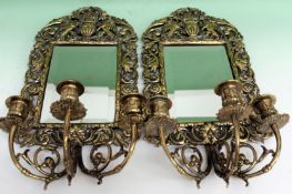 A pair of 19th Century brass framed rectangular wall mirrors with three branch candle arms. 45cm