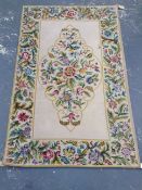 A needlepoint rug of French design, 234 x 147cm.