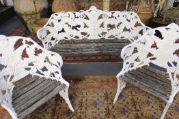 A circa 1950s white painted aluminium of Victorian style three piece garden suite. Two seater settee