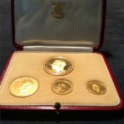 A George VI proof specimen gold coin set. Five pounds, Two pound, Sovereign and half sovereign (