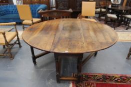 An early oak gateleg table with fitted drawer. 158 x 178cm (open).