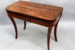 An early 19th Century rosewood and brass strung fold over card table. ‘D’ form top over four long