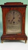 A Regency rosewood cased small bracket clock with silvered dial. Single fusee, by Purvis North