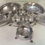 A set of four silver oval bon bon dishes with pierced sides. London 1903. Makers Goldsmith and