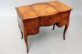 A French kingwood Louis XV and later poudreuse. Mirror centre section flanked by compartments. Apron