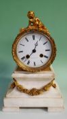 A late 19th Century French gilt metal and marble mantel clock with eight day striking movement on