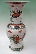 A Chinese baluster vase decorated in famille verte polychrome enamels. Figures in exterior settings.
