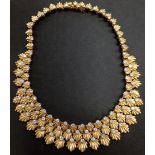 A fine gold and diamond fringe necklace by Van Cleef and Arpels. Made in France. The clasp stamped