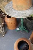 A Victorian Coalbrookdale pattern circular topped table on green painted pedestal and marble top.