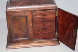 A 19th Century mahogany specimen cabinet fitted with eighteen short drawers with three long base