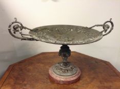 A late 19th Century French style two handled brass tazza with marble base. 28cm diameter x 20cm