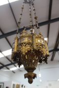 A late Victorian gilt bronze Gothic Revival hanging hall light. In the manner of Pugin. Elaborate