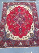 A Persian roomsize carpet, 380 x 295cm.