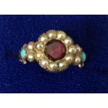 An early Victorian seed pearl turquoise and gem set ring. Inscribed ‘Remember Me’.