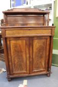 A William IV mahogany chiffonier of small size. Raised shelf gallery back over frieze drawer and