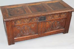 An early small panelled oak coffer. 108cm wide x 48cm deep.