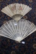 A late 19th Century French pierced lace fan with pierced ivory sticks and guards. Painted with