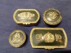 Four French Empire style lidded brass boxes. With Neo Classical designs to lids. (4)