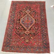 A Persian Hamadan rug, 213 x 149cm.