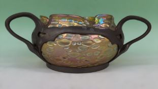 A Loetz iridescent Art glass bowl, in Art Nouveau style pewter mounts. 10cm high.