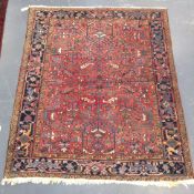 A Persian Heriz carpet, 242 x 207cm.