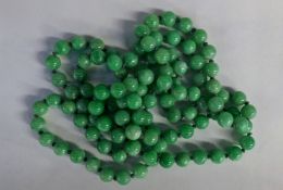 A single strand of jadeite beads. 57cm long.