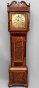 A 19th Century longcase clock. Thirty hour movement with engraved brass dial. Signed Joseph Halifax,