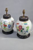 A pair of Chinese famille rose ginger jars. Figural decoration mounted as lamps.