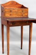 An inlaid Georgian ladies writing table. Multi drawer upper section above hinged writing surface