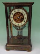 A 19th Century four glass table clock. Enamel dial with Arabic numerals. Two train gong strike