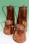 Two pairs of Arts and Crafts copper water jugs by Benson. 23 x 12cm high.