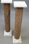 A pair of white marble and granite display pedestals. Square tops, column shafts. 106cm high.