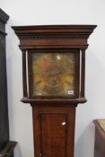 A late 18th Century brass faced oak longcase clock with thirty hour movement. 28cm square dial.