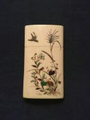 A late 19th Century Japanese ivory card case with shibiyama decoration depicting quail and flowering