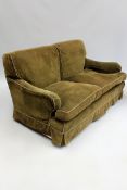 A bespoke Howard style two seater settee with feather filled upholstery standing on short square