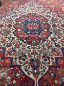 A large Persian Baktiari carpet, approx 540 x 400cm.