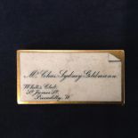 A gentleman’s 18ct gold vesta case with white enamelled visiting card decoration of Mr Chas Sydney